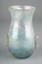 A Roman iridescent glass vase with applied lower section handles, approx 12cm high