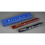 A Waterman no 32 Ideal blue and green marble fountain pen, the barrel marked WATERMAN'S REG.US.