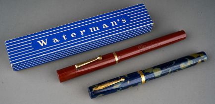 A Waterman no 32 Ideal blue and green marble fountain pen, the barrel marked WATERMAN'S REG.US.