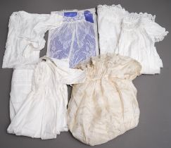 A collection of vintage babies Christening robes mainly cotton plain or broidered, some silk