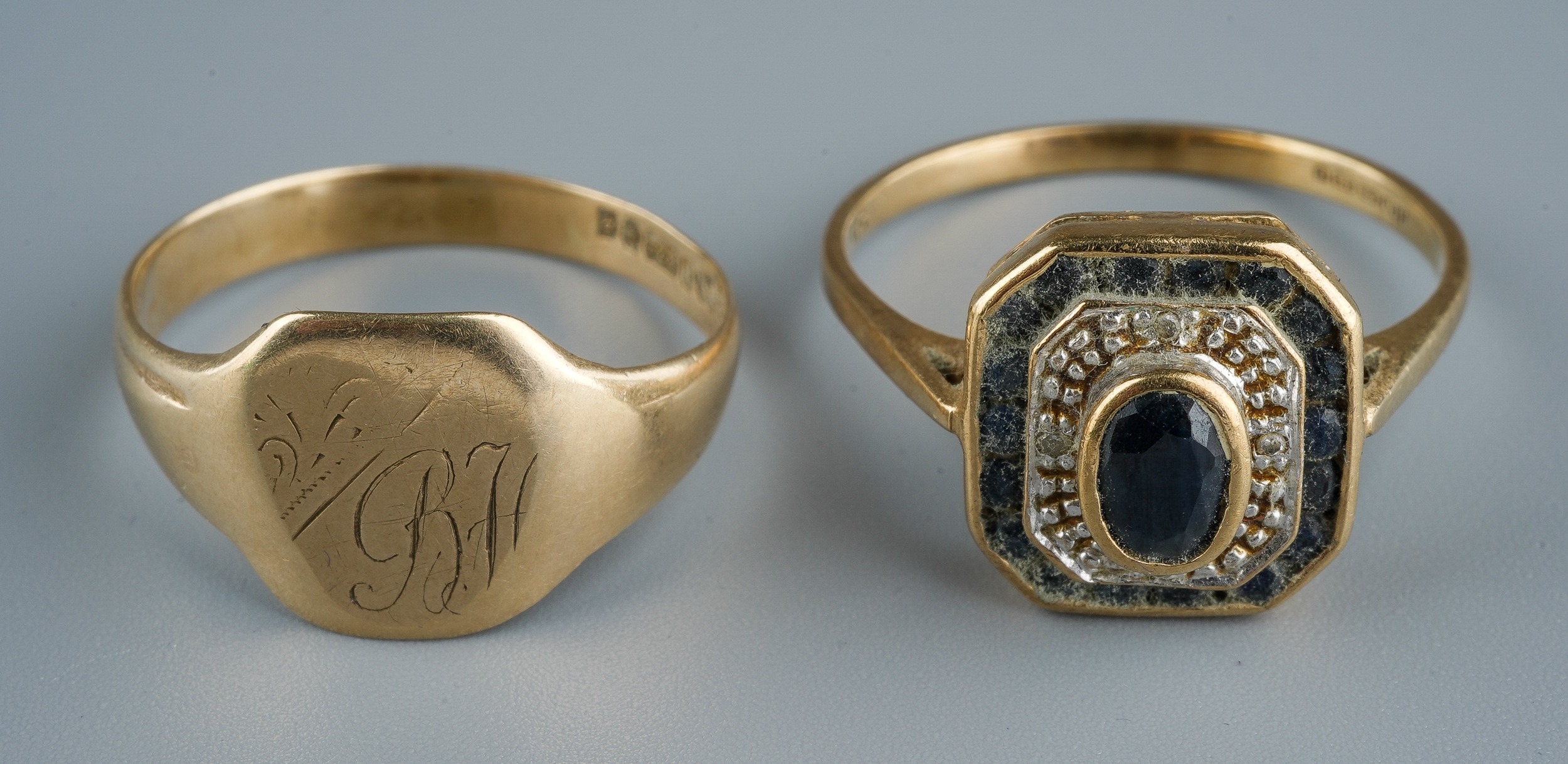 A 9ct yellow gold signet ring, size Q1/2, gross weight approx 2.1g; a 9ct yellow gold and sapphire