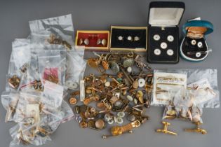 A quantity of cufflinks and dress studs, including enamelled sporting interest, printed and