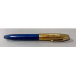 A vintage Sheaffer blue snorkel fill fountain pen, the gold nib stamped SHEAFFER'S 14K R USA, the