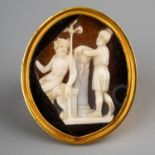 A 19th century yellow gold and cameo ring, the 26mm x 21mm hardstone cameo carved depicting