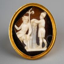 A 19th century yellow gold and cameo ring, the 26mm x 21mm hardstone cameo carved depicting