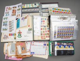 A large stamp collection comprising of an album of mint presentation packs, 1990-4 approximately,