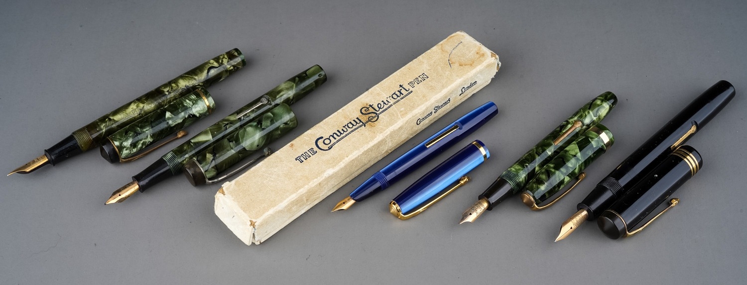 A collection of five early 20th Century Conway Stewart fountain pens to include: boxed blue and - Image 2 of 5