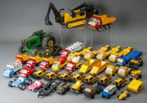 Tonka Toys. Two trays of play worn vehicles to include 6 small scale bulldozers and 8 articulated