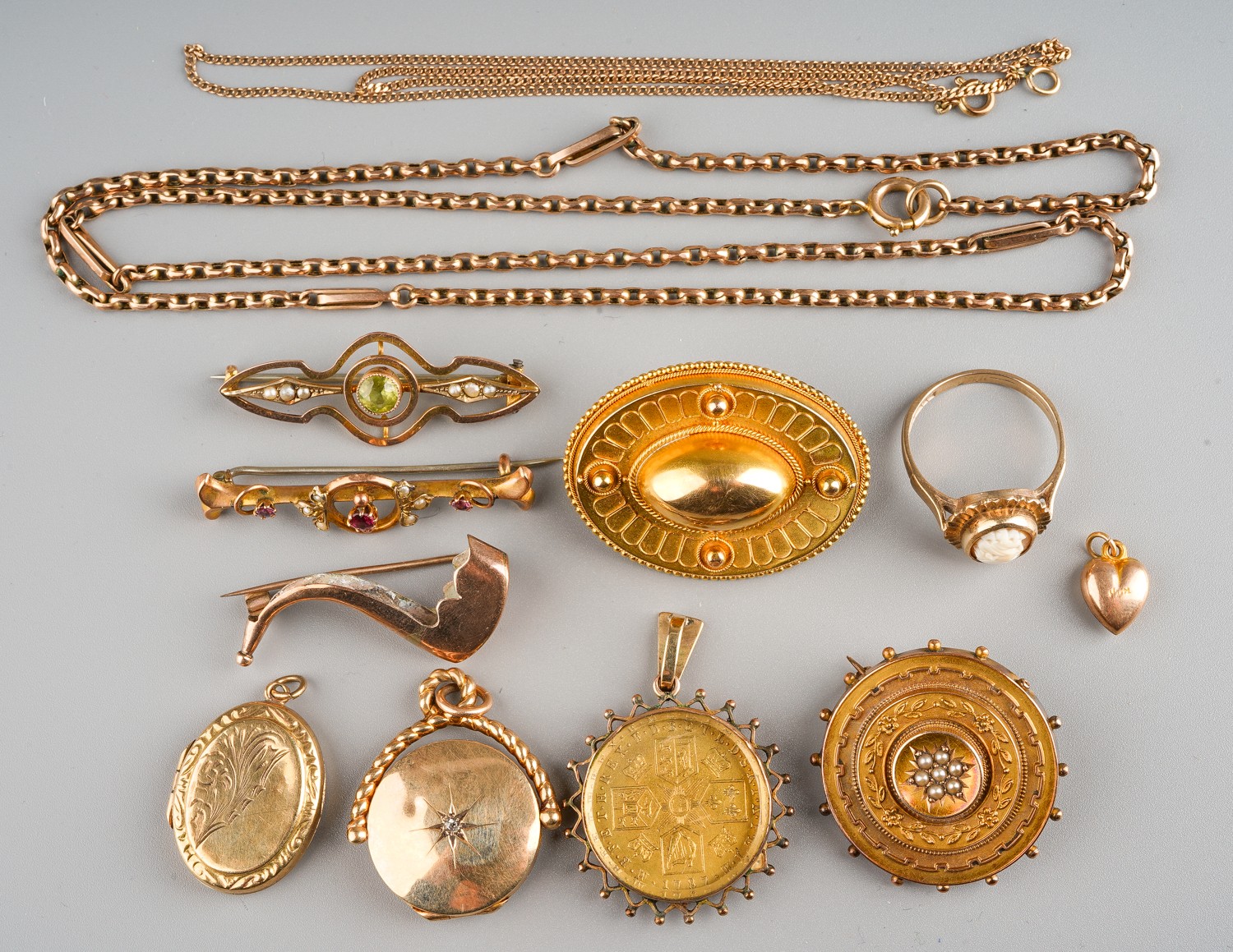 A group of gold jewellery, including 9ct gold lockets, Victorian brooch, Edwardian peridot and