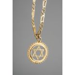 A 9ct gold star pendant and fancy-link chain, total gross weight approx 17.8g Good condition, wear