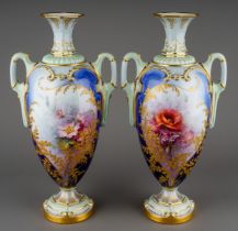 A pair of early 20th Century Royal Worcester vases, shape no: 2256, with flared octagonal necks, the