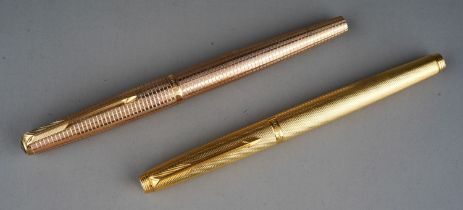 A rolled gold Parker pen, the 14K nib stamped PARKER 585 FRANCE with Parker hallmark, the cover