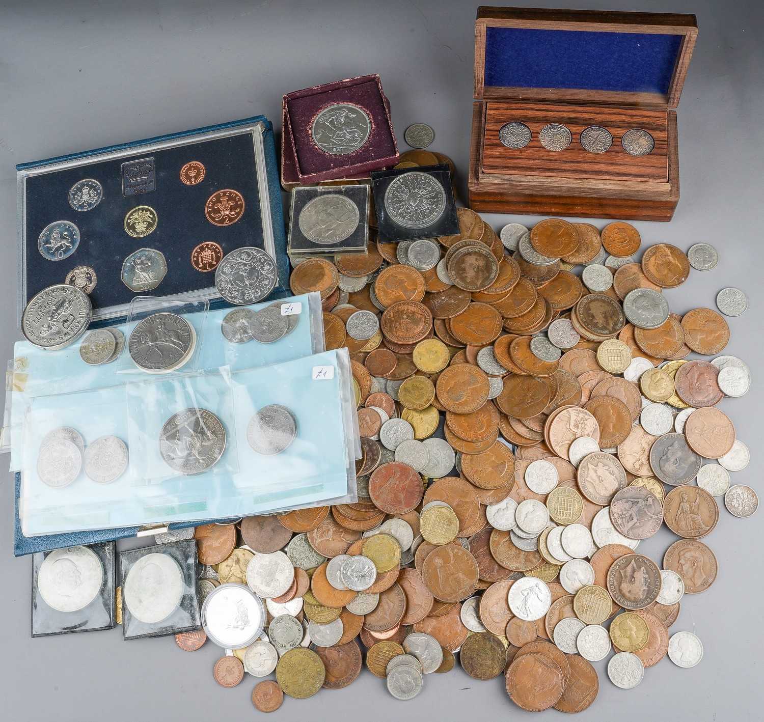 A large quantity of coinage to include a replica hammered coin set in a wooden box, etc. (1 box)