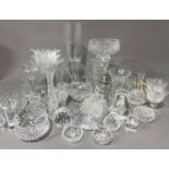 A collection of cut and moulded glass to include: wine glasses, bowls, vases, condiment set,