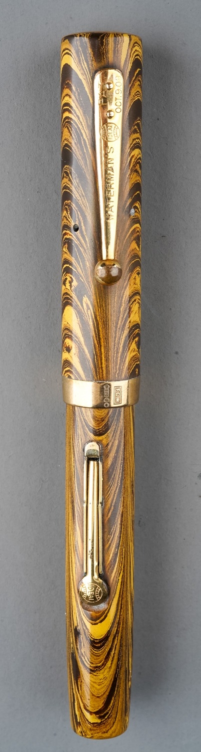 A Waterman 52 Ideal fountain pen, the gold ripple barrel marked WATERMAN'S REG US PAT. OFF. FOUNTAIN