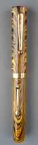 A Waterman 52 Ideal fountain pen, the gold ripple barrel marked WATERMAN'S REG US PAT. OFF. FOUNTAIN