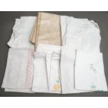 Assorted vintage mainly linen or cotton or damask table (table clothes, runners etc) and bed