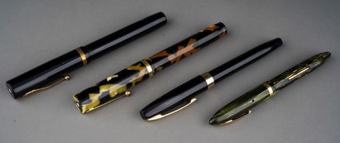 A collection of vintage Sheaffer's fountain pens to include: 1. black and gilt Lifetime fountain