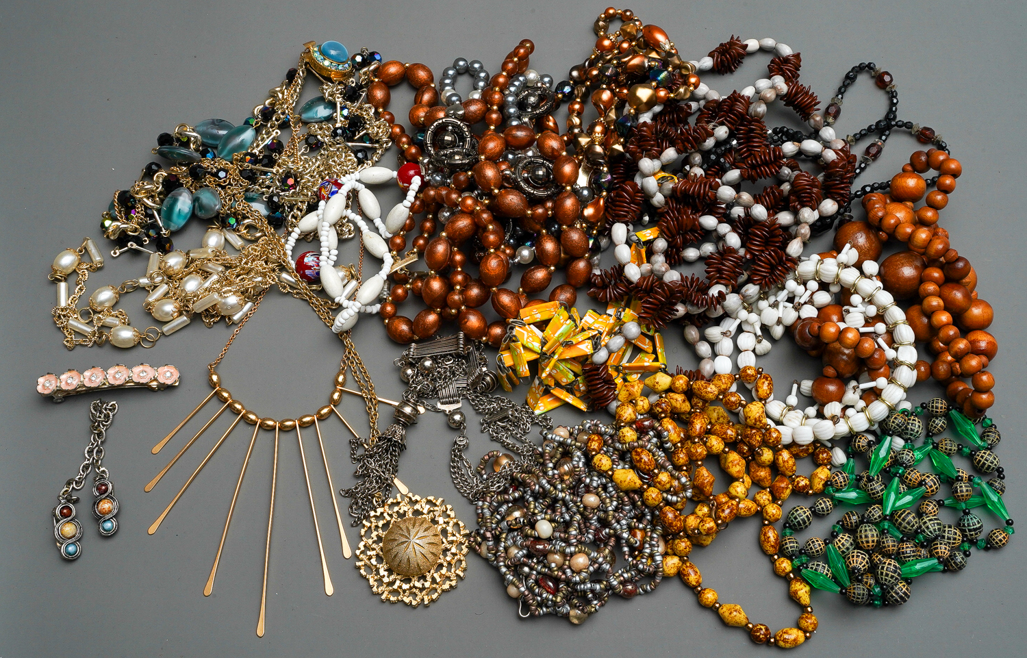 Assorted costume jewellery mainly bead necklaces (6 JARS)