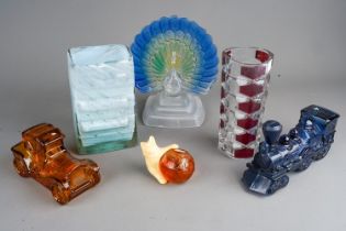 Three boxes of assorted coloured studio glass type including vases, paperweights, table ornaments,