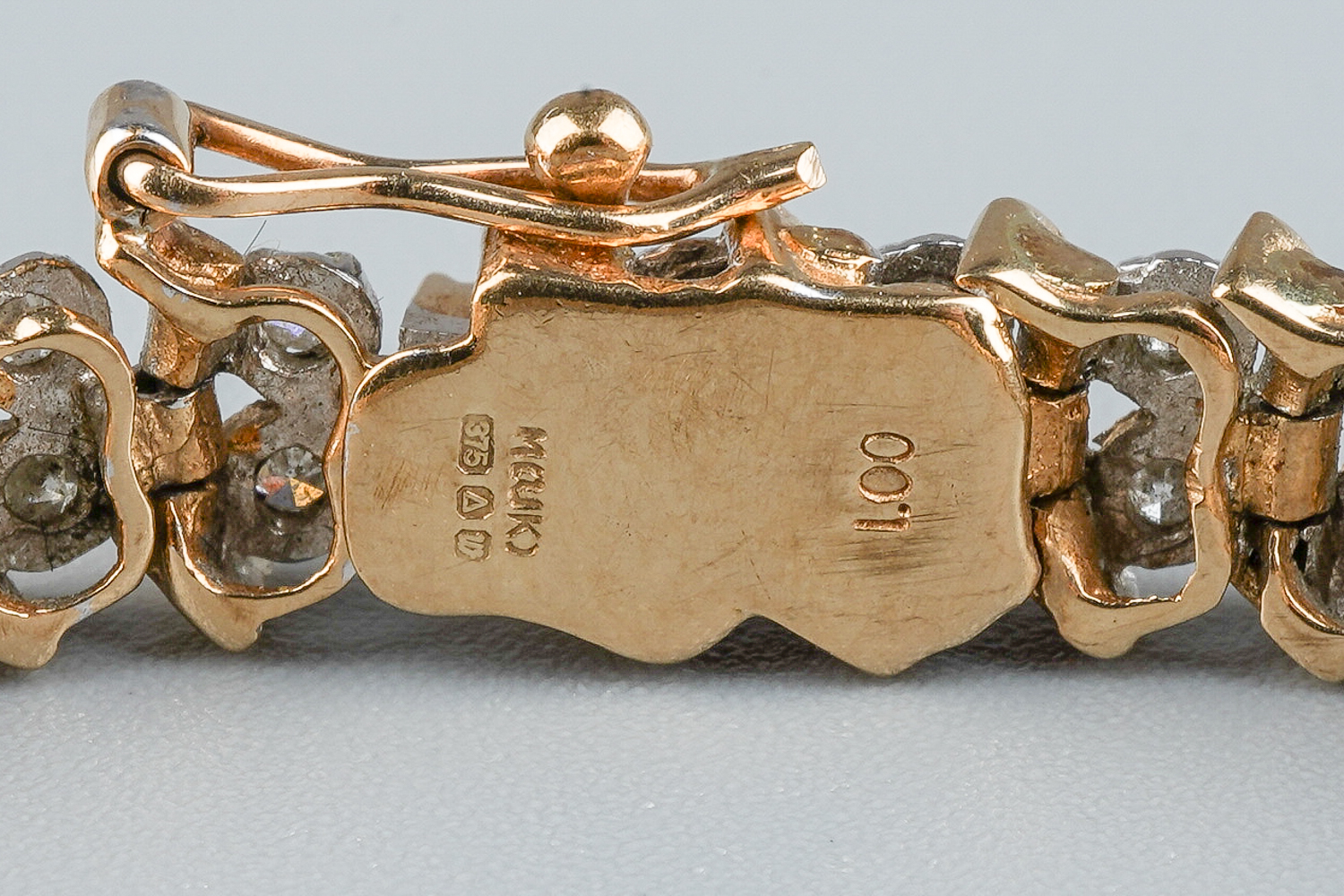 A 9ct gold and diamond line bracelet, with two round brilliant-cut diamond set links between S - Image 3 of 5