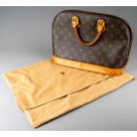 Louis Vuitton - a monogram Alma handbag, the domed shaped satchel designed with maker's classic