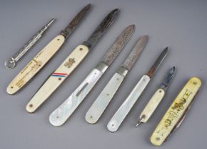 Two early 20th Century silver mounted mother-of-pearl fruit knives, both blades hallmarked Sheffield