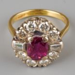 An 18ct yellow gold ruby and diamond cluster ring, set with an oval-cut ruby within a border of