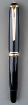 A Montblanc black no 252 fountain pen, with 14c gold nib stamped 14c MONTBLANC 585, gilt fittings,