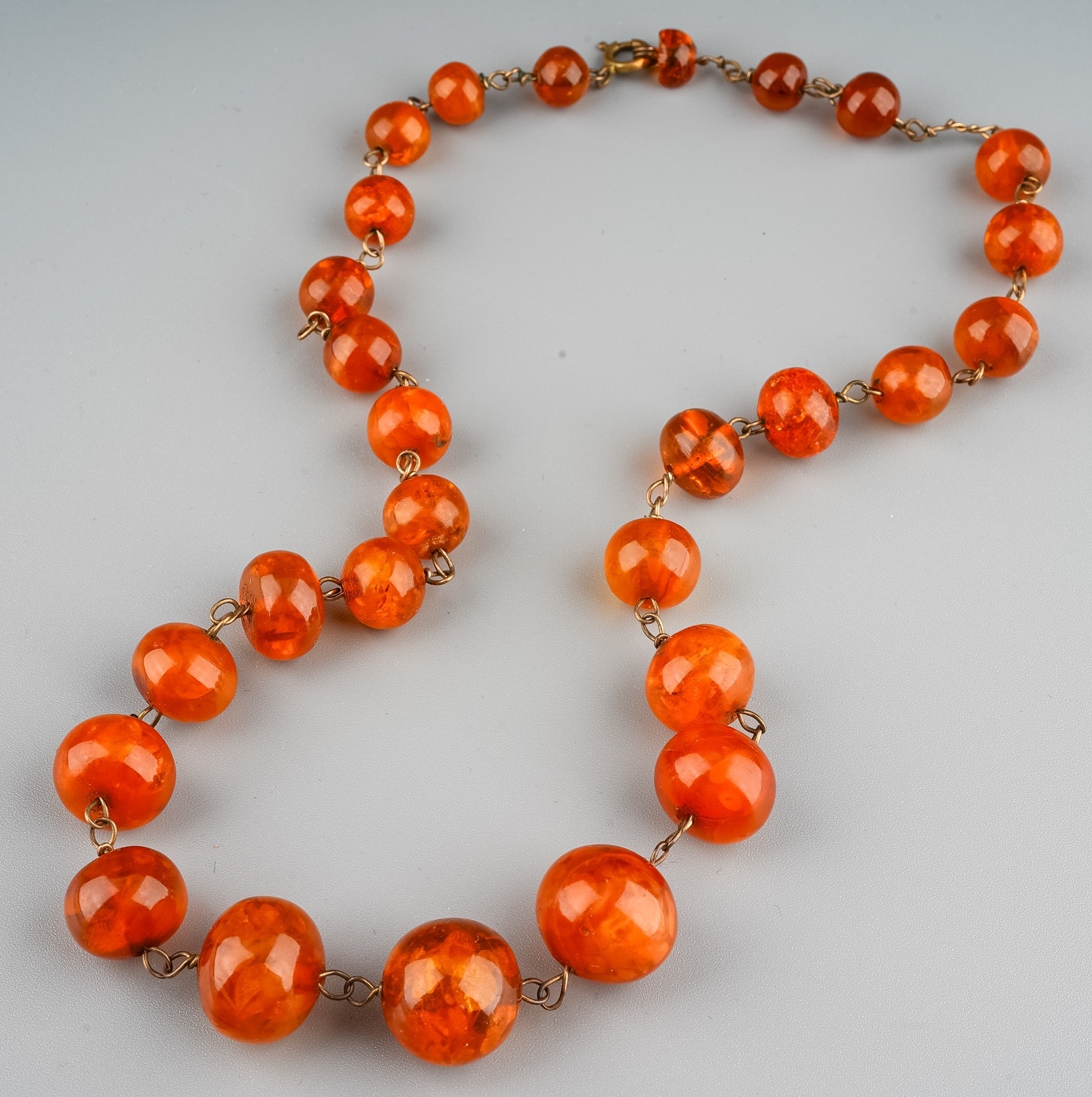 A graduated amber bead necklace, 46cm long, total gross weight approx 22g Good, wear commensurate