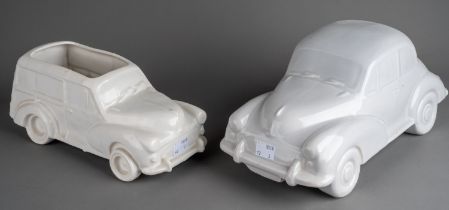 A large Dartmouth style ceramic model of a grey Morris Minor 1000 and a smaller white Morris
