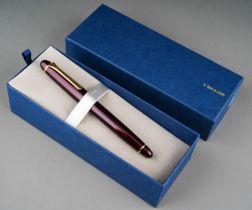 Two Japanese Sailor fountain pens both with 14k gold nibs stamped 14K 585 bodies in purple and