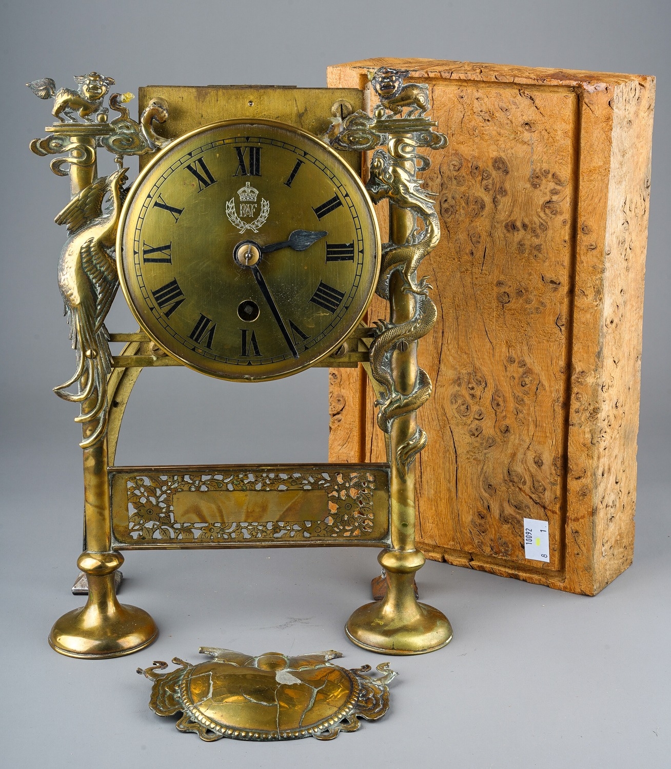 Unique British RAF Presentation clock in bronze, decorated with Peacocks and Lions. Missing the case