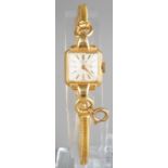 An 18k yellow gold Eldor ladies wristwatch and strap, total gross weight approx 25.3g; together