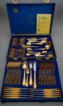 A cased Solingen 23/24 carat gold plated ornate eleven piece (place setting) canteen of cutlery /