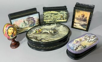 A collection of 5 Russian lacquered boxes including hand painted and signed examples together with a