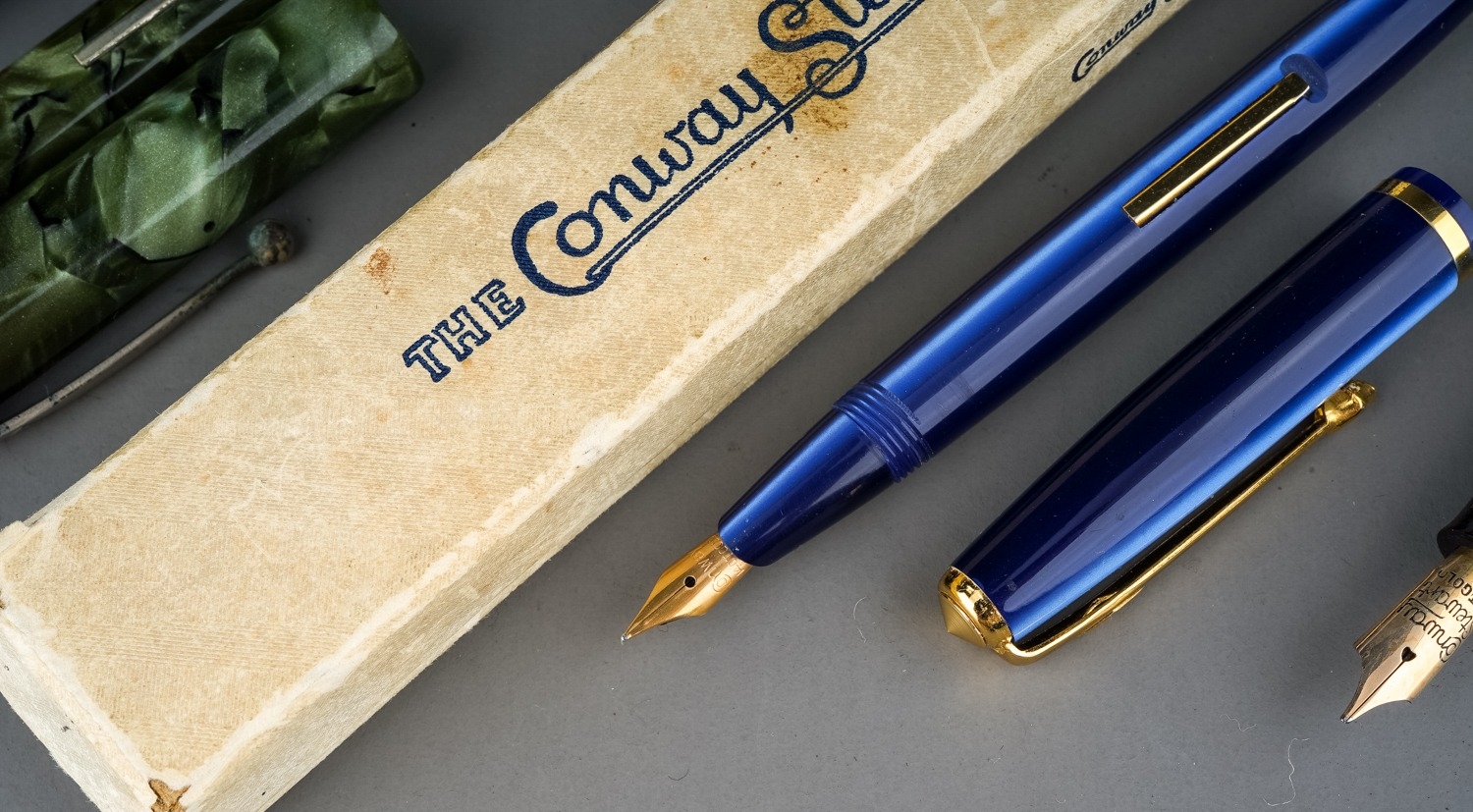 A collection of five early 20th Century Conway Stewart fountain pens to include: boxed blue and - Image 4 of 5