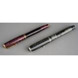 A vintage Parker Vacumatic fountain pen, the black and mother-of-pearl "button filled" barrel and