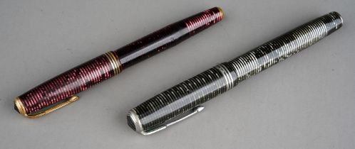 A vintage Parker Vacumatic fountain pen, the black and mother-of-pearl "button filled" barrel and