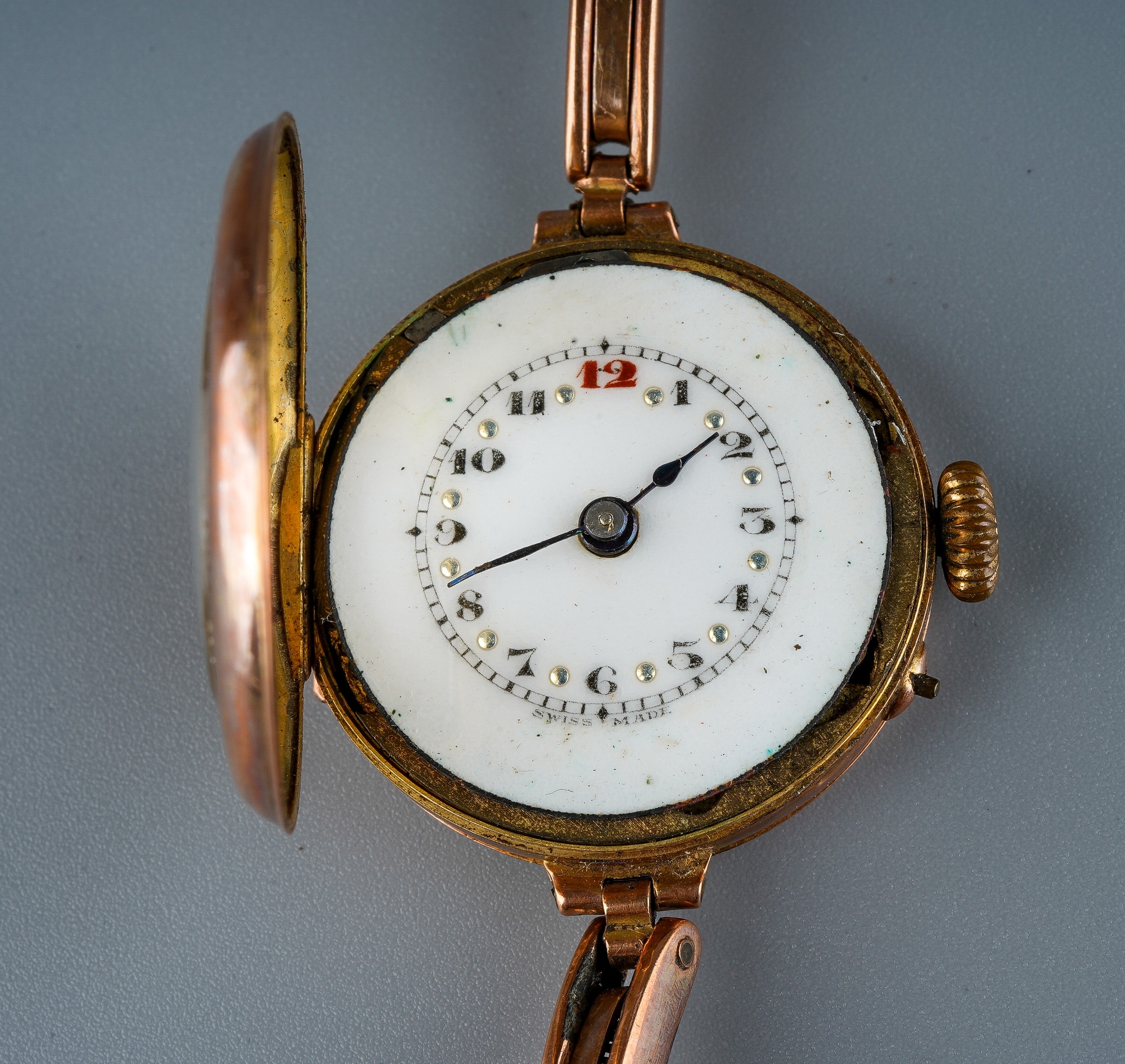 A 1930s 9ct rose gold watch, white enamel dial with Arabic numerals, integral expanding 9ct stap, - Image 4 of 4