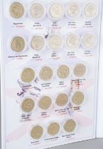 Limited edition coin collectors album complete with specimens of all the £1 coins issued between