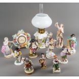 Collection of Continental porcelain figures to include a pair of Meissen ones (af), German incrusted