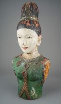 An Asian decorative painted wood bust of a young woman, with jewel decoration, approx 41cm high