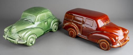 A large Dartmouth style ceramic models of green Morris Minor 1000 and an amber Morris Traveller (