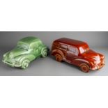 A large Dartmouth style ceramic models of green Morris Minor 1000 and an amber Morris Traveller (