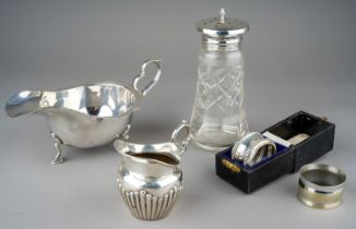 Assorted silver table ware to include: Georgian style sauceboat, by AJZ, Birmingham, 1911; Victorian