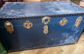 A 20th Century large navy brass bound trunk, approx 101cm wide x 51cm deep (a/f)