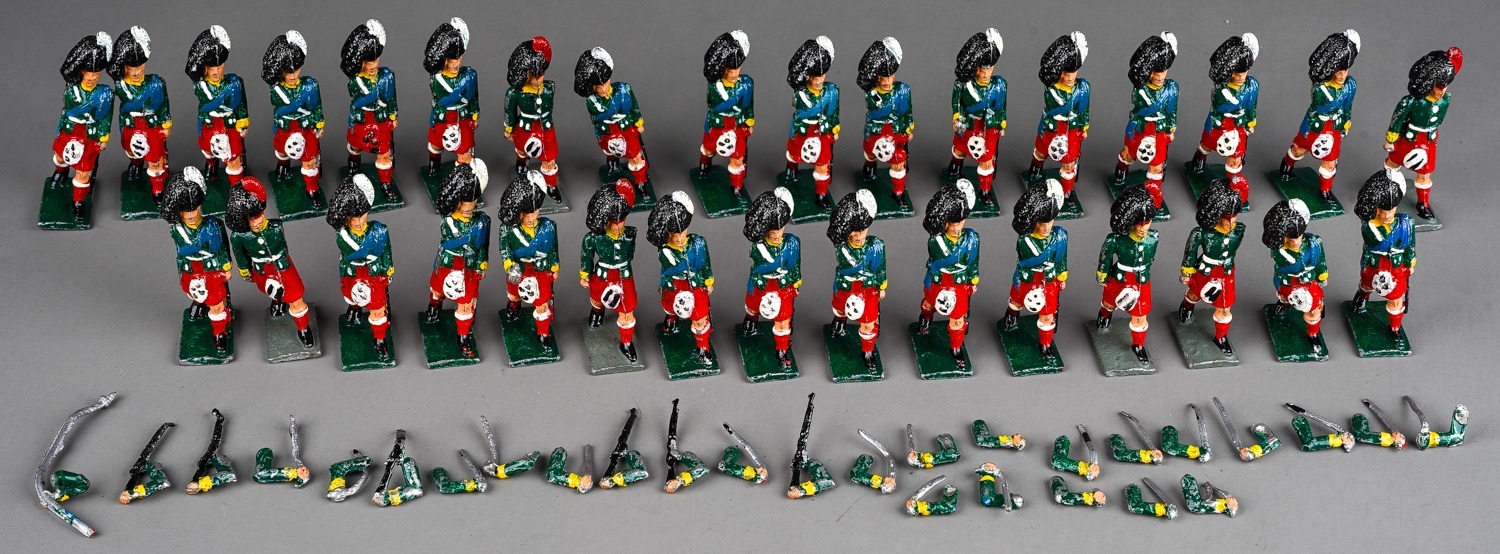 Vintage Britains or similar a collection of 32 white metal Scottish Black Watch model soldiers