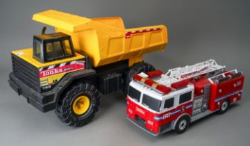Tonka Toys. A Mighty dump truck. Mighty 768 transfer with a plastic bodied fire engine. Large