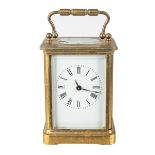 A French brass eight-day carriage clock, with key